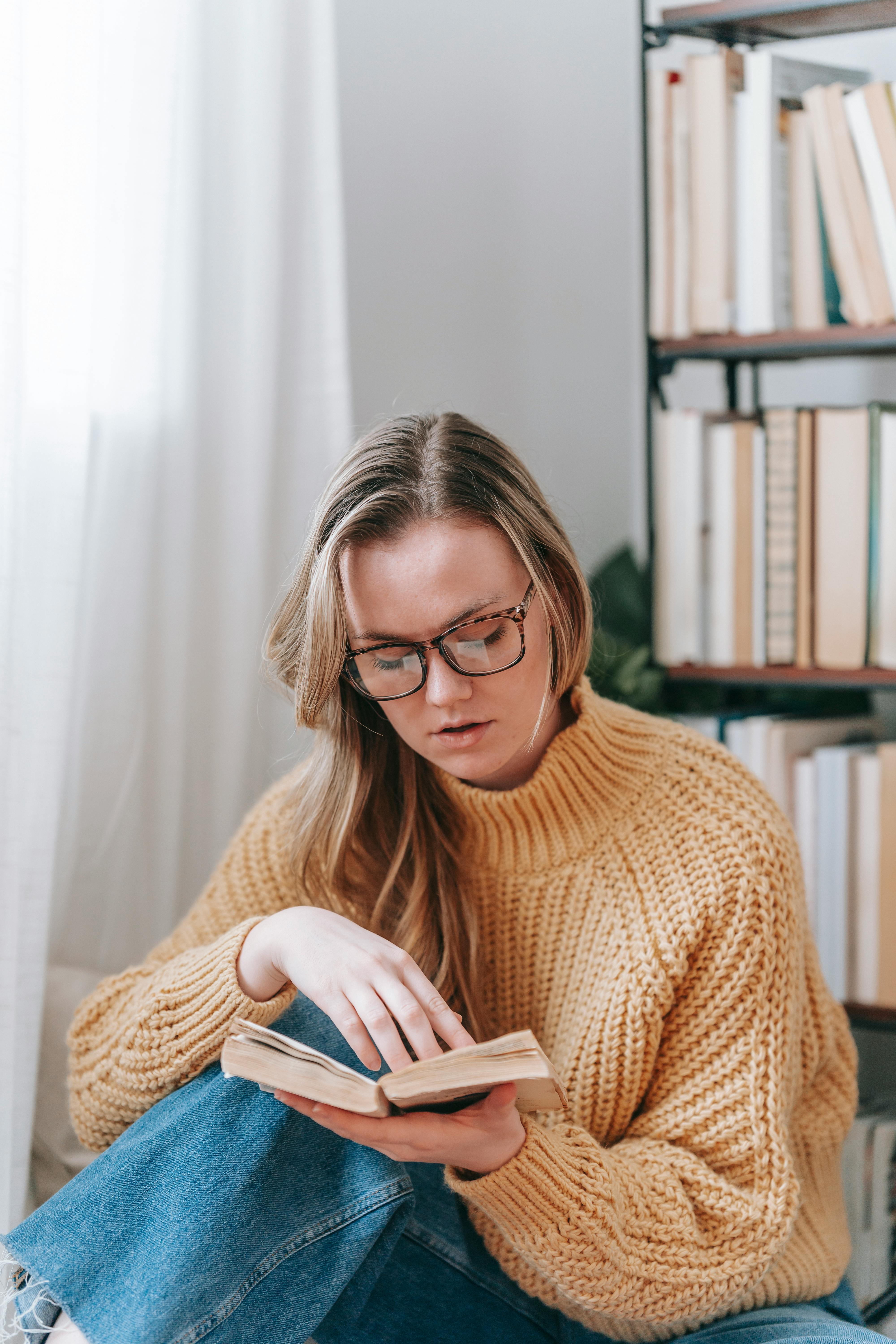 Adult reading a book